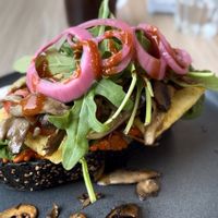 Just Brekkie: activated charcoal sourdough slice, roasted red pepper spread. Just Egg. organic mushrooms, tomatoes, greens, hot sauce 🤤😋
  at Feast & Fallow in Vancouver