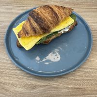 Croissant breakfast sandwich   at Feast & Fallow in Vancouver