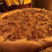 Vegan cheese pizza w bbq tempeh   at Satchel's Pizza in Gainesville