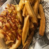 vegan hot dog with pineapple, crispy onions and bbq sauce with boardwalk fries. at Old Dominion Doggery & Burger in Strasburg