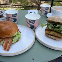 BLAT - baking, lettuce, avocado and sun-dried tomato on brioche.  Get it on ciabatta next time.  Double chocolate croissant in upper left corner.   Italian tofu sandwich on right   at Little Loaf Bakeshop in New Paltz