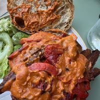 Steak and cheese sando with oat cheese.   Ask for less sauce.  I also left out the onions. They are happy to accommodate and their kitchen is really quick, too    at Little Loaf Bakeshop in New Paltz