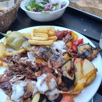 Beilage Salat and Donner Teller after several bites at doen doen® kebap in Stuttgart