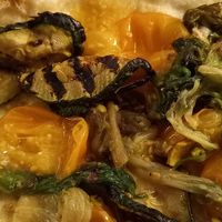 Fabrizio Pizza: grilled vegetables, yellow cherry tomatoes, escarole and pistachios. at Pizza e Contorni in Naples