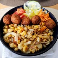 Cachoupa with falafel. at Nha Gost in Santa Maria