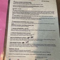 One side of the menu. Also separate menu with toasties and drinks   at Kawa Cafe in Surry Hills