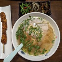 I ordered the Japanese noodle set meal which included a bowl of noodles, a mock meat skewer, three vegetable sides, and a mock pan fried egg (not pictured). Everything was truly de at Baiyi Vegetables Lanzhou Sulamian - 百易素食·素拉面（元大都店) in Beijing