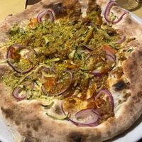 Vegetariana pizza with mozzarella removed and pistachio grain added. Delicious    at Pizzeria Villa Zuccaro in Taormina