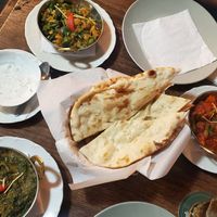 Naan with all the plates at Tandoor King Indian Restaurant in Karlovy Vary