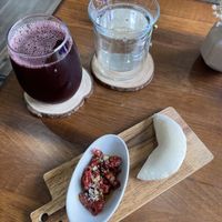 chicha morada, sparking water, and pita with sun dried tomatoes  at Boochmania in San Francisco