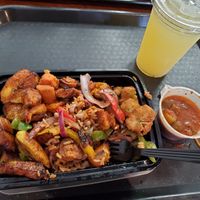Build your own bowl with red rice, black eyed peas, fried okra, sweet plantains and sweet potates. at Okra African Grill in Omaha