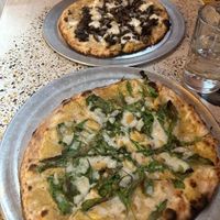 Funghi pizza (top) and Bianco pizza (bottom). at Humble Wood Fire Pizza in Gainesville