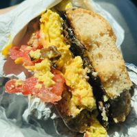 Classic egg, cheese, tomato, bacon. Gluten-free and all vegan!  at Humble Wood Fire Pizza in Gainesville