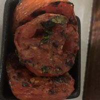 Grilled tomatoes  at MY.KA Cafe Mysore in Karnataka