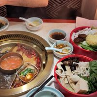 Mushroom, medium spicy and tomato broth with vegan ingredient selection at De Zhuang Hot Pot 罗马 德庄火锅 in Rome