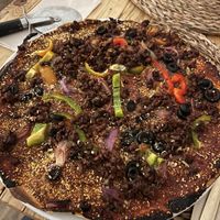 Carne bbq vegan pizza  at Pizza Natura in Barcelona