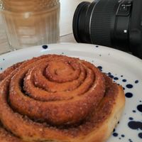 iced cappuccino with almond milk and a cinnamon roll at Bundu in Kaunas