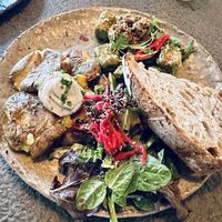 Herbed tofu and truffled smashed potatoes.   at Honest Greens - Chiado in Lisbon