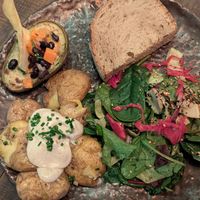 Veggie Plate with two sides - grilled avo and truffle smashed mini-potatoes  at Honest Greens - Chiado in Lisbon