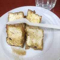 Pan fried tofu made vegan upon request (no fish sauce)  at Excellent Tofu & Snacks in Richmond