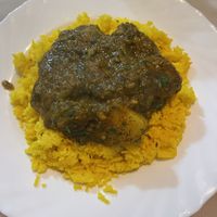 Spinach & potato curry with pilau rice  at KK's Bar & Restaurant in Nerja