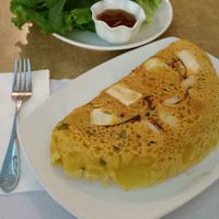Vietnamese Sizzling Crepe with tofu, shrimp, bean sprouts, greens, and fish sauce at Veggie Today in Concord