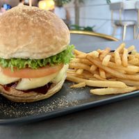 Burger (with pineapple) and fries   at nomVnom Cafe in Johor Bahru