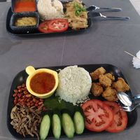 Haianese chicken rice and nasi lemak at nomVnom Cafe in Johor Bahru