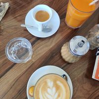 Oat latte, espresso, juice  at Alma Kitchen & Coffee in Tangier