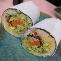 Green vegan sushi burrito at Fusho in Milan