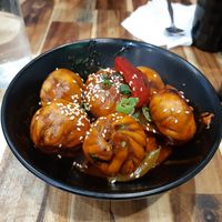 Vegan Momos with spicy sauce at Momo Central - Bourke St in Melbourne