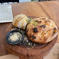 Burrata (igual um queijo de castanha cremoso, não chamaria de burrata) com melado at Moringa in Niteroi