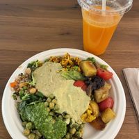 Various homemade salads with hummus and a fresh juice 😋  at Artisti del Vegetariano - Corso Magenta in Milan