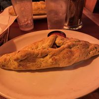 pod with spinach dough, vegan cheese, mushrooms, carrots, black olives  at Pizza Plant in Williamsville