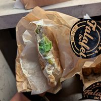 Vegan shawarma sandwich with hummus at Falafel Inc in Washington