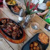 Some of the sharing platter for 2: aubergine and mushrooms in a peanut sauce, Malay curry (with tofu on my request - adapted from their menu), chips, jollof rice and fried plantain at Cape To Cairo in Shildon