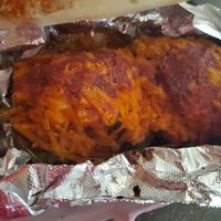 THE DETROIT STUFFED PEPPER - Brown rice and black beans, Detroit Pepper Red Sauce, and garlic seasonings, and your choice of cheese and meat. (used jackfruit and vegan cheddar) at The Detroit Pepper Company in Detroit