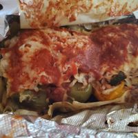 VEGAN STUFFED PEPPER - Stuffed Bell Pepper with brown rice and quinoa, red sauce, squash, black beans, and zucchini, and your choice of cheese. (used vegan mozzarella) at The Detroit Pepper Company in Detroit