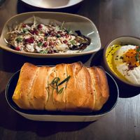 The fire-roasted eggplant and whipped "ricotta" with herb bread was a great start to the meal. at Anixi in New York City