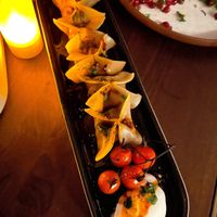 MANTI "LAMB" POCKETS - Tomato confit, brown butter, yogurt, sumac, lemon, parsley

 at Anixi in New York City