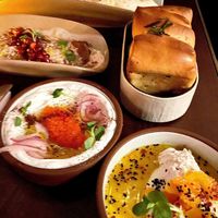Choice of 3 Dip Mezze $26 Includes choice of 1 housemade bread at Anixi in New York City