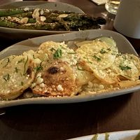 Sides of mustard almond asparagus and lemon potatoes  at Anixi in New York City