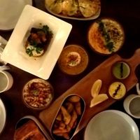 Everything we ordered: 3 dip Mezze with layered herb bread, artichoke tots, beef dolmas and confit potatoes everything delicious favs were the dolmas, ricotta and eggplant dips and at Anixi in New York City