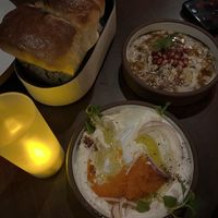 Taramasalata (closest), fire roasted eggplant & layered herb bread  at Anixi in New York City