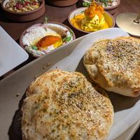 All 5 Dip Mezze $40
Includes choice of 2 housemade breads

Excellent and would order again at Anixi in New York City