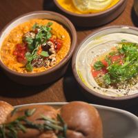 olive tahini, muhammara and whipped ricotta. All amazing! Whipped ricotta to die for. at Anixi in New York City