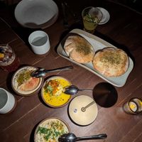 Three dip mezze with za'atar pita at Anixi in New York City