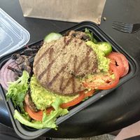 A very sad salad. Good avocado!  at LAX - Built Custom Burgers - T2 in Los Angeles