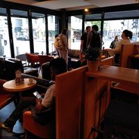 Place to sit indoor and outdoor, including spots to charge at Coffee Fellows - Schillerstraße in Munich