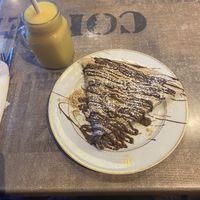 Vegan biscuit crepe with tropical smoothie  at Quick Crepes in Bury